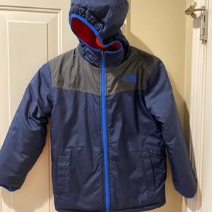 Reversible North Face boys coat.  Orange and blue